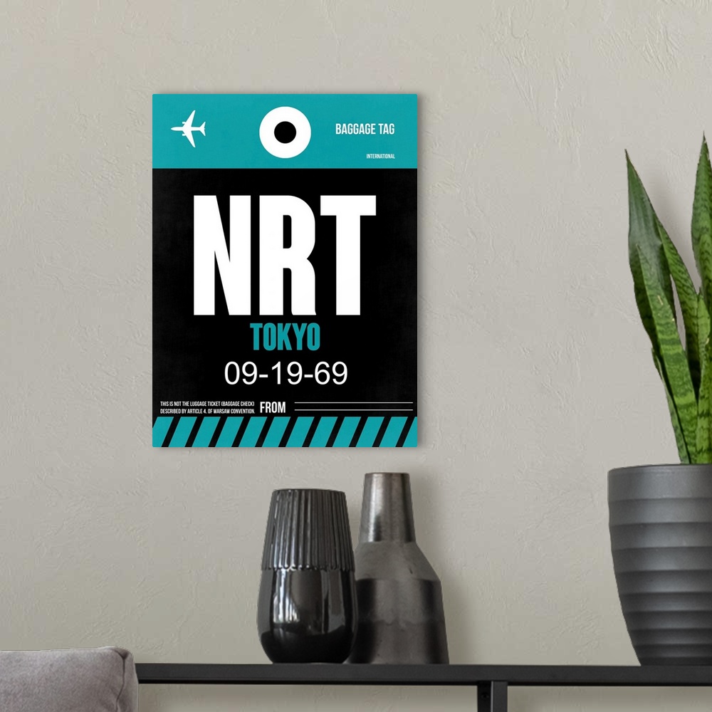 A modern room featuring NRT Tokyo Luggage Tag II