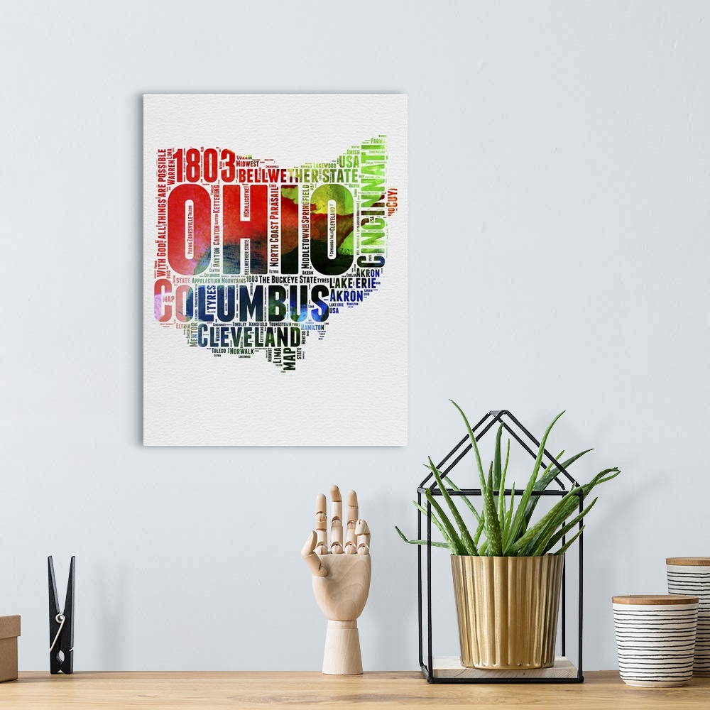 A bohemian room featuring Watercolor typography art map of the US state Ohio.