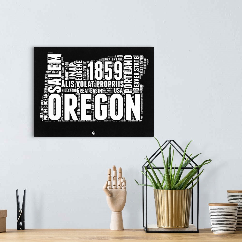 A bohemian room featuring Typography art map of the US state Oregon.