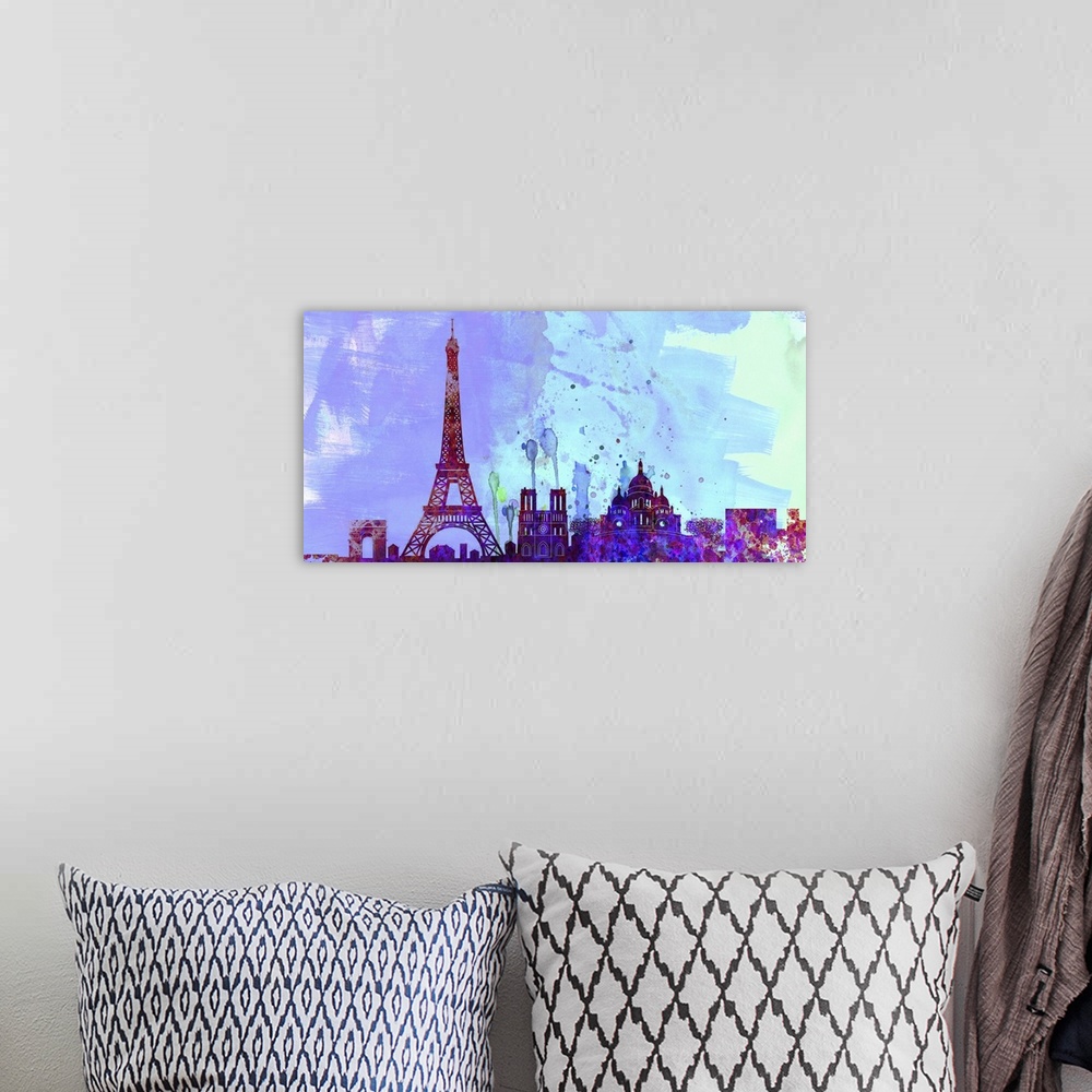 A bohemian room featuring Watercolor artwork of the silhouette of the Paris city skyline.