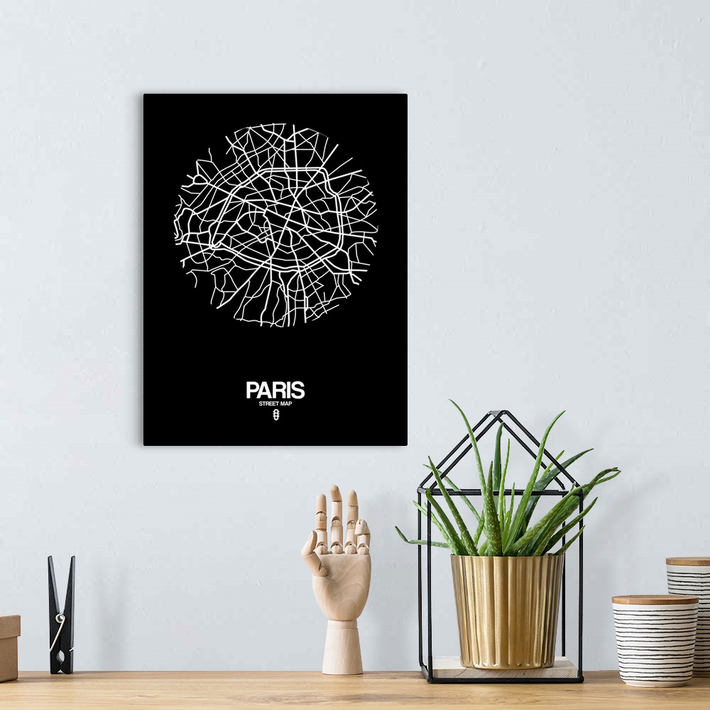 A bohemian room featuring Minimalist art map of the city streets of Paris in black and white.