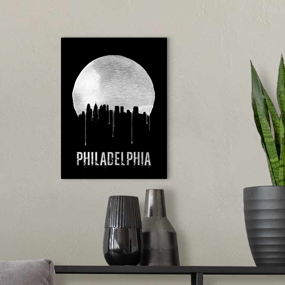 A modern room featuring Contemporary watercolor artwork of the Philadelphia city skyline, in silhouette.