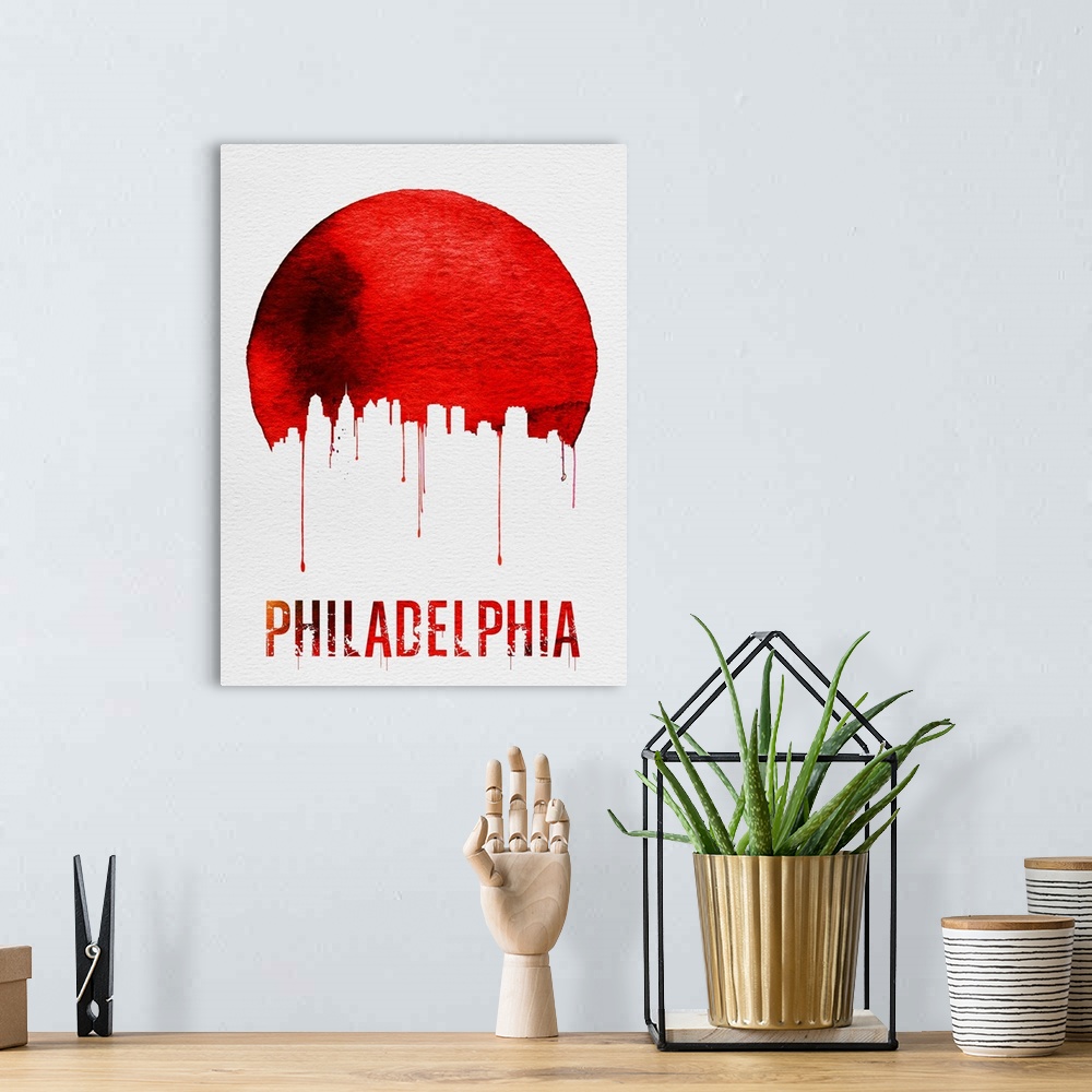 A bohemian room featuring Contemporary watercolor artwork of the Philadelphia city skyline, in silhouette.