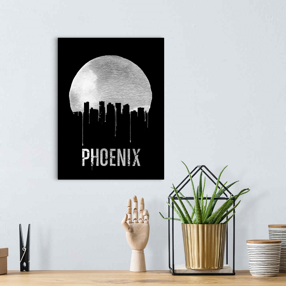 A bohemian room featuring Contemporary watercolor artwork of the Phoenix city skyline, in silhouette.