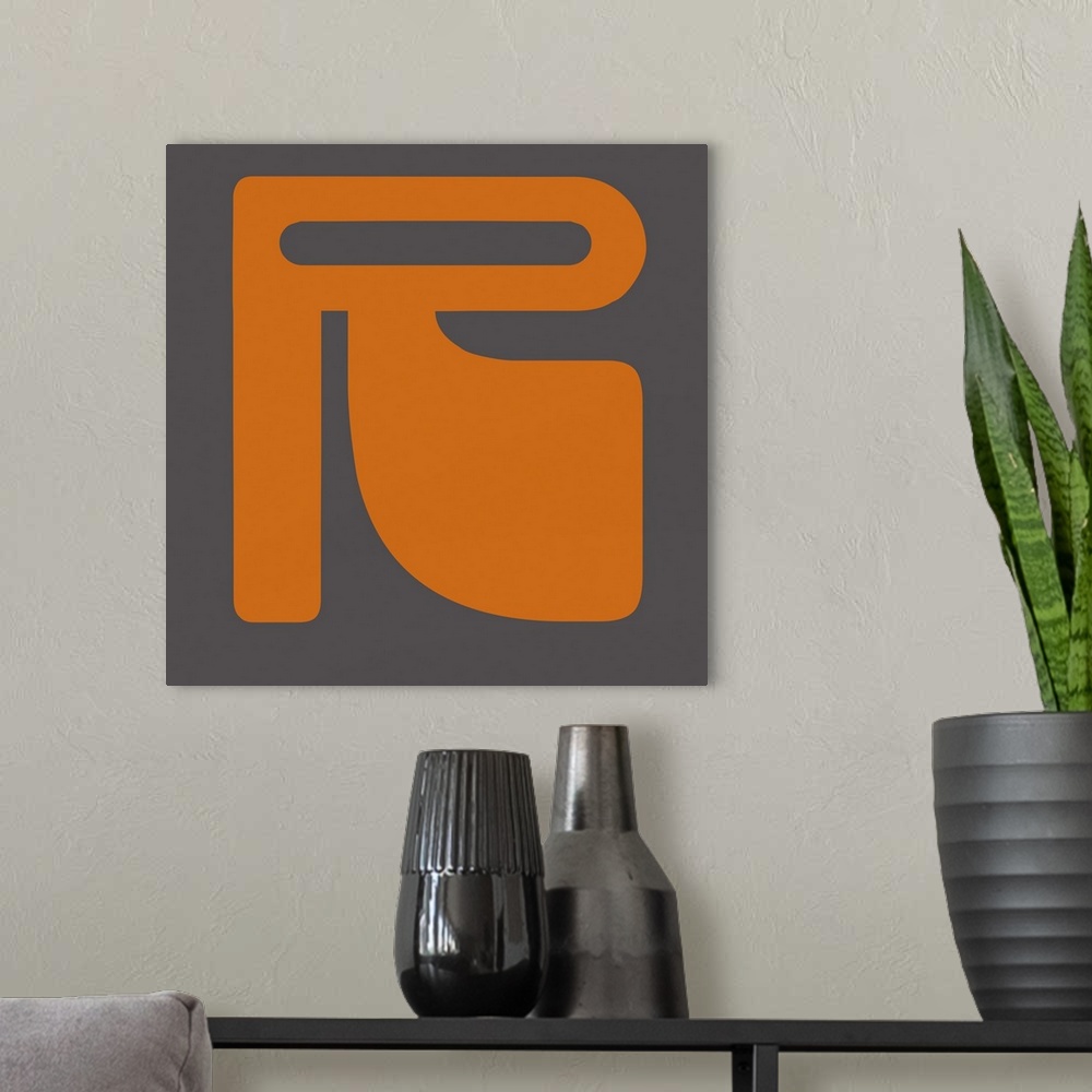A modern room featuring Retro 1960's Alphabet Letter - R - Orange