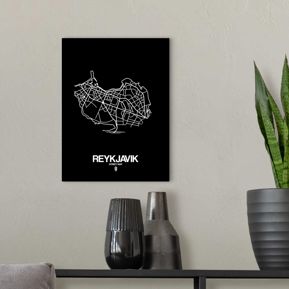 A modern room featuring Minimalist art map of the city streets of Reykjavik in black and white.