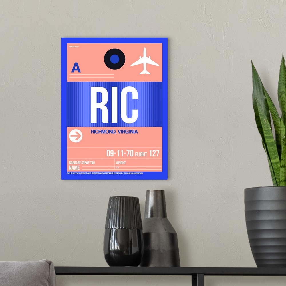 A modern room featuring RIC Richmond Luggage Tag II