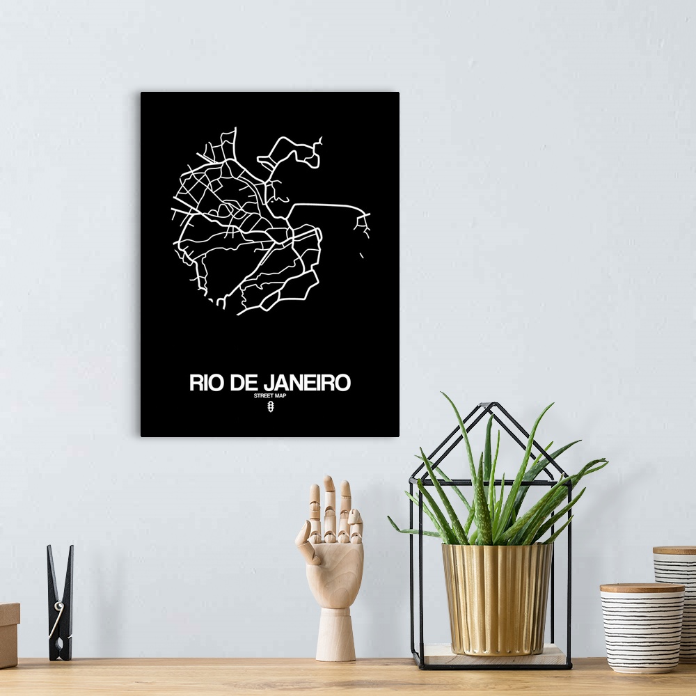 A bohemian room featuring Minimalist art map of the city streets of Rio De Janeiro in black and white.