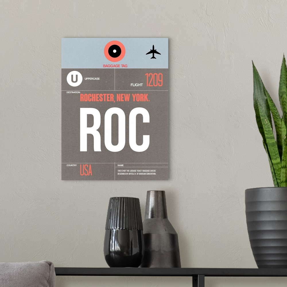 A modern room featuring ROC Rochester Luggage Tag II