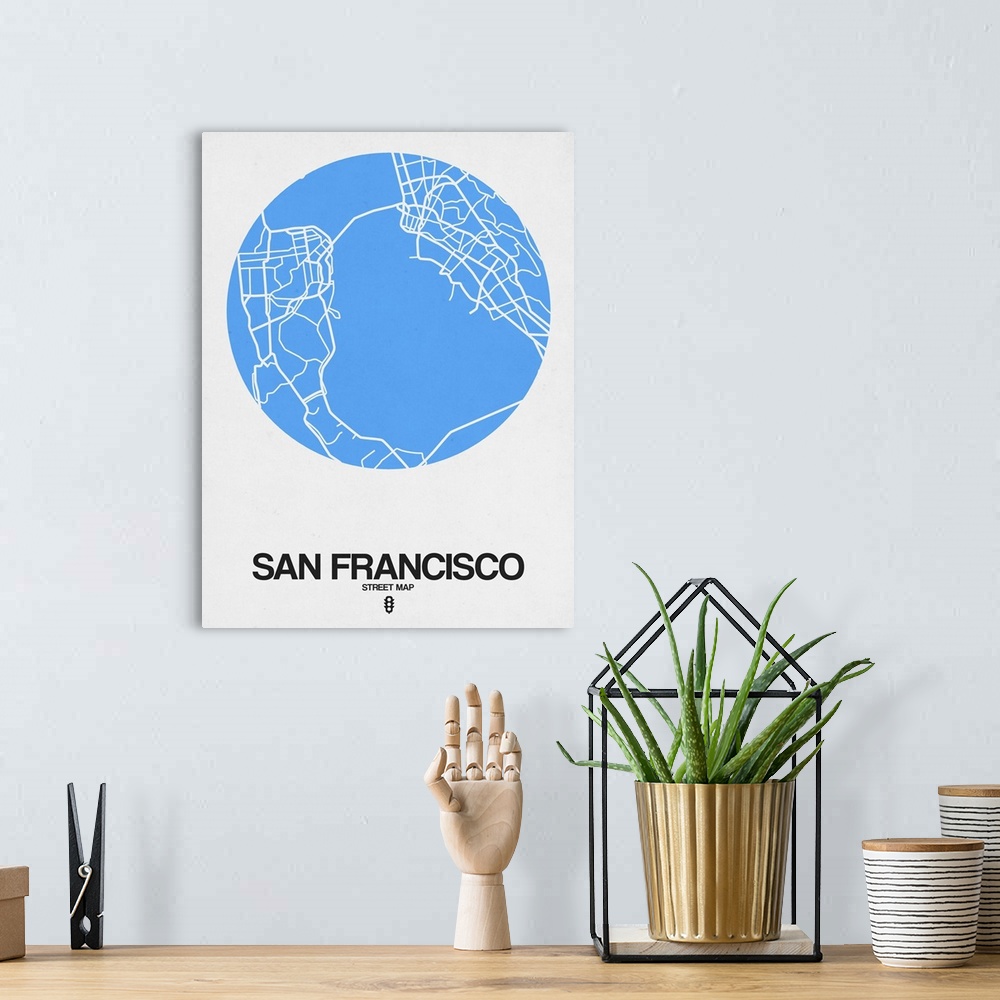 A bohemian room featuring Minimalist art map of the city streets of San Francisco in white and blue.
