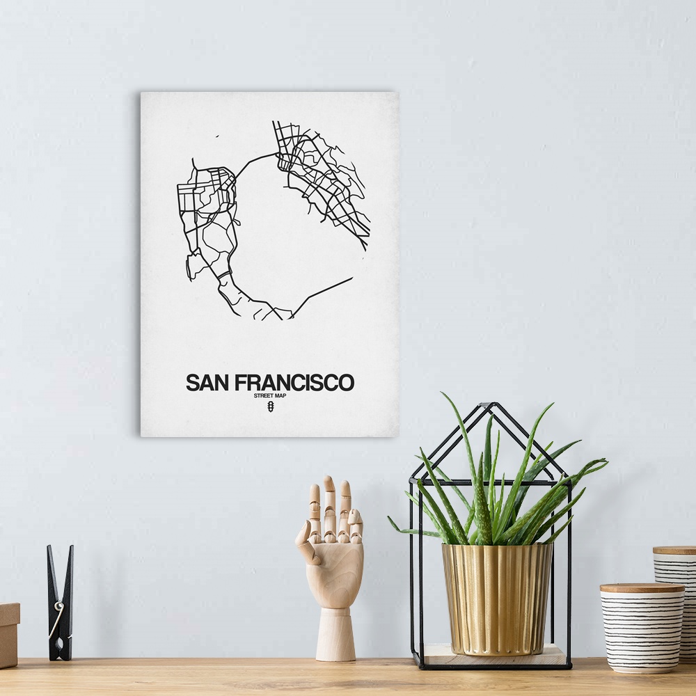 A bohemian room featuring Minimalist art map of the city streets of San Francisco in white and black.