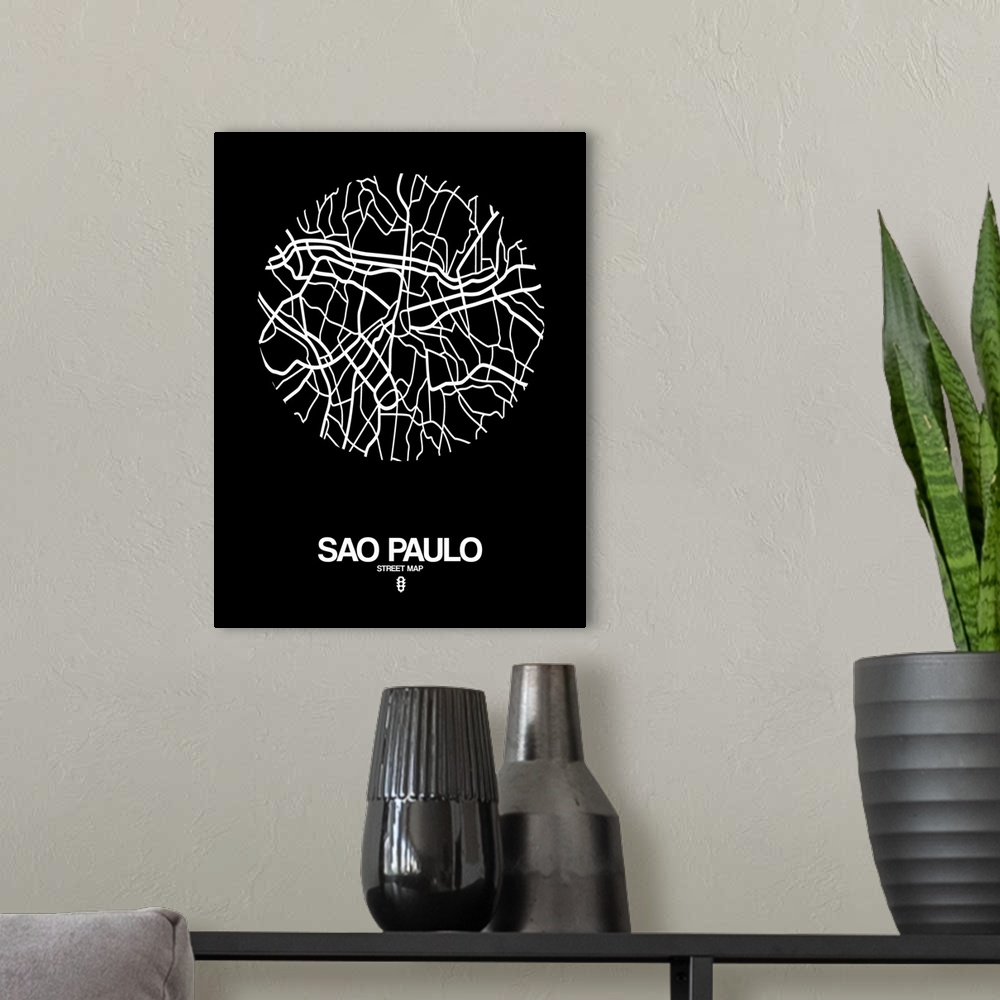A modern room featuring Minimalist art map of the city streets of Sao Paulo in black and white.