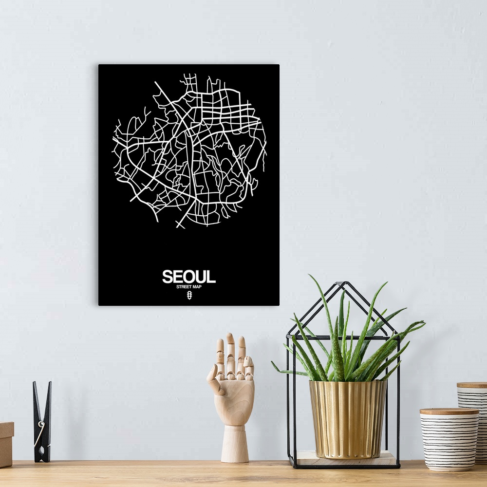 A bohemian room featuring Minimalist art map of the city streets of Seoul in black and white.