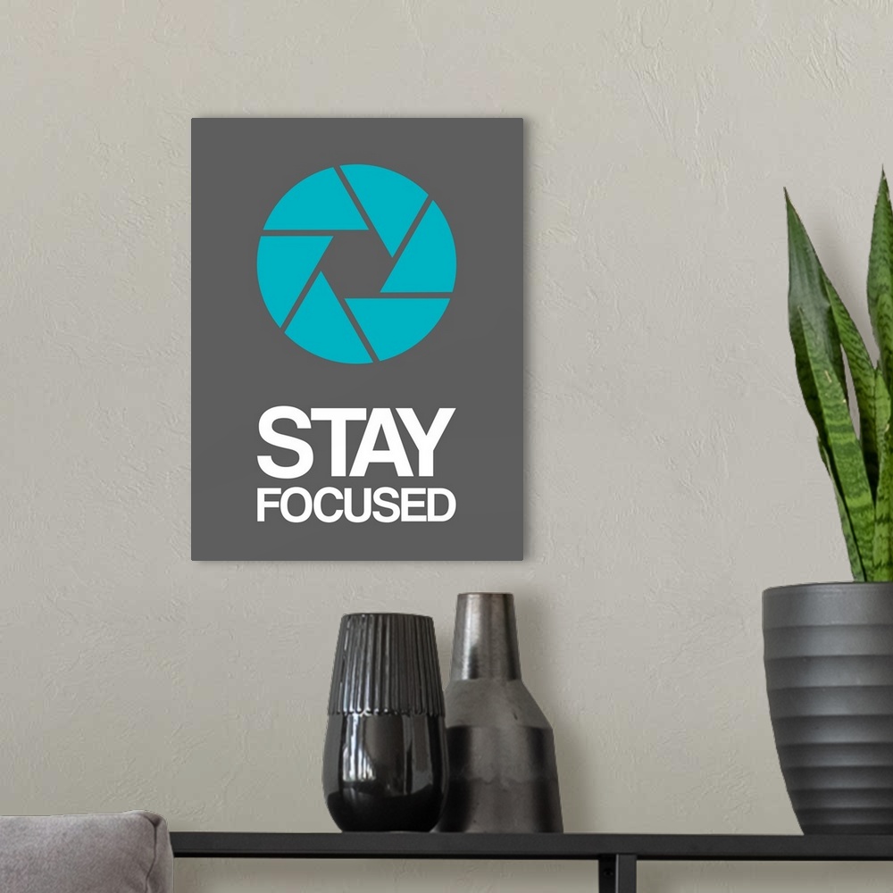 A modern room featuring Stay Focused Circle Poster IV