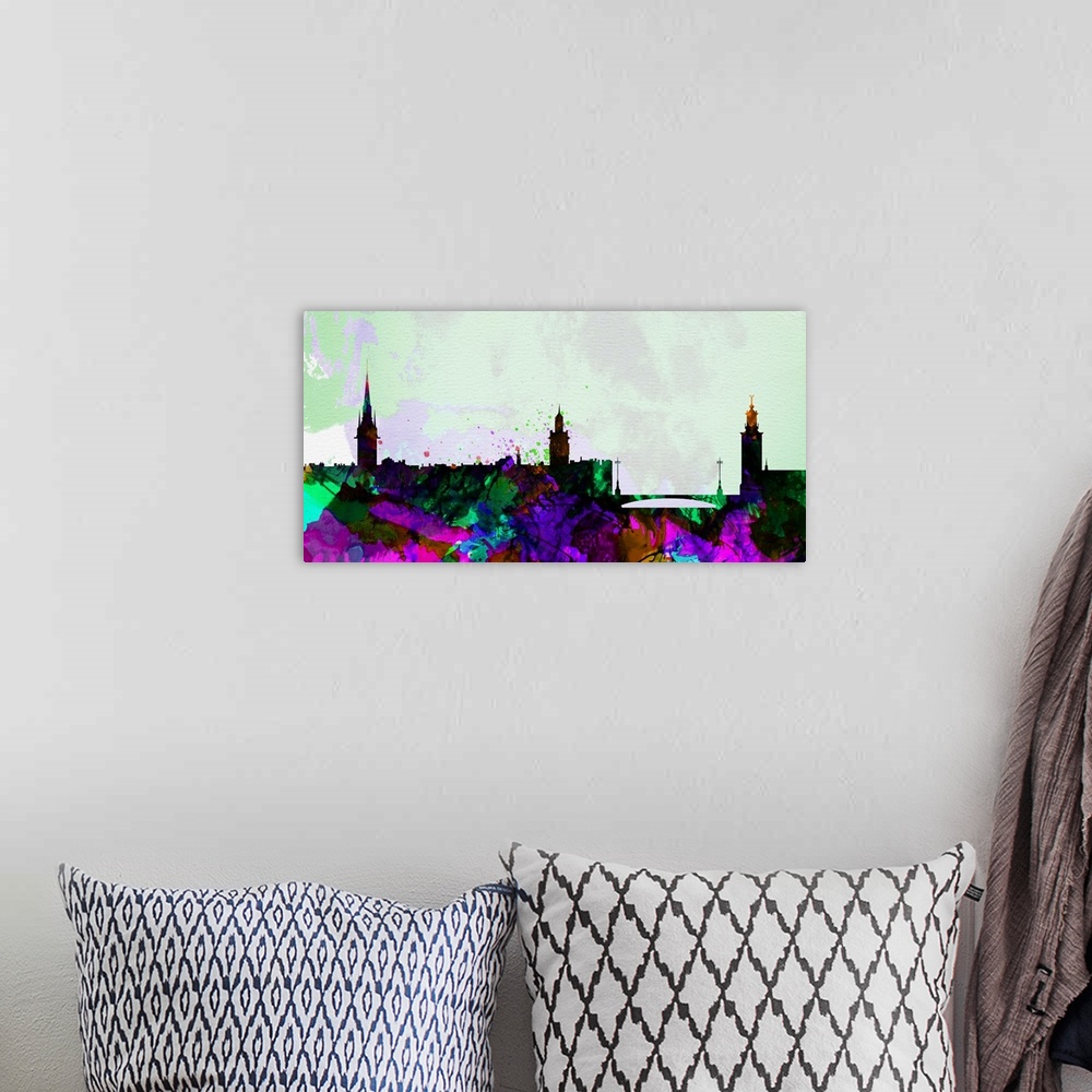 A bohemian room featuring Watercolor artwork of the silhouette of the Stockholm city skyline.