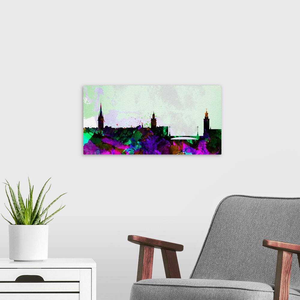 A modern room featuring Watercolor artwork of the silhouette of the Stockholm city skyline.