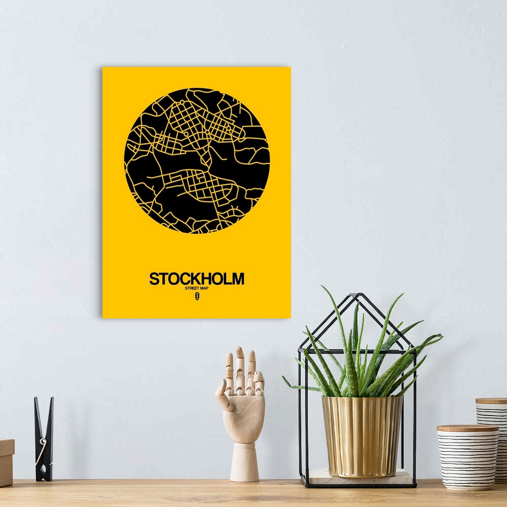 A bohemian room featuring Minimalist art map of the city streets of Stockholm in yellow and black.