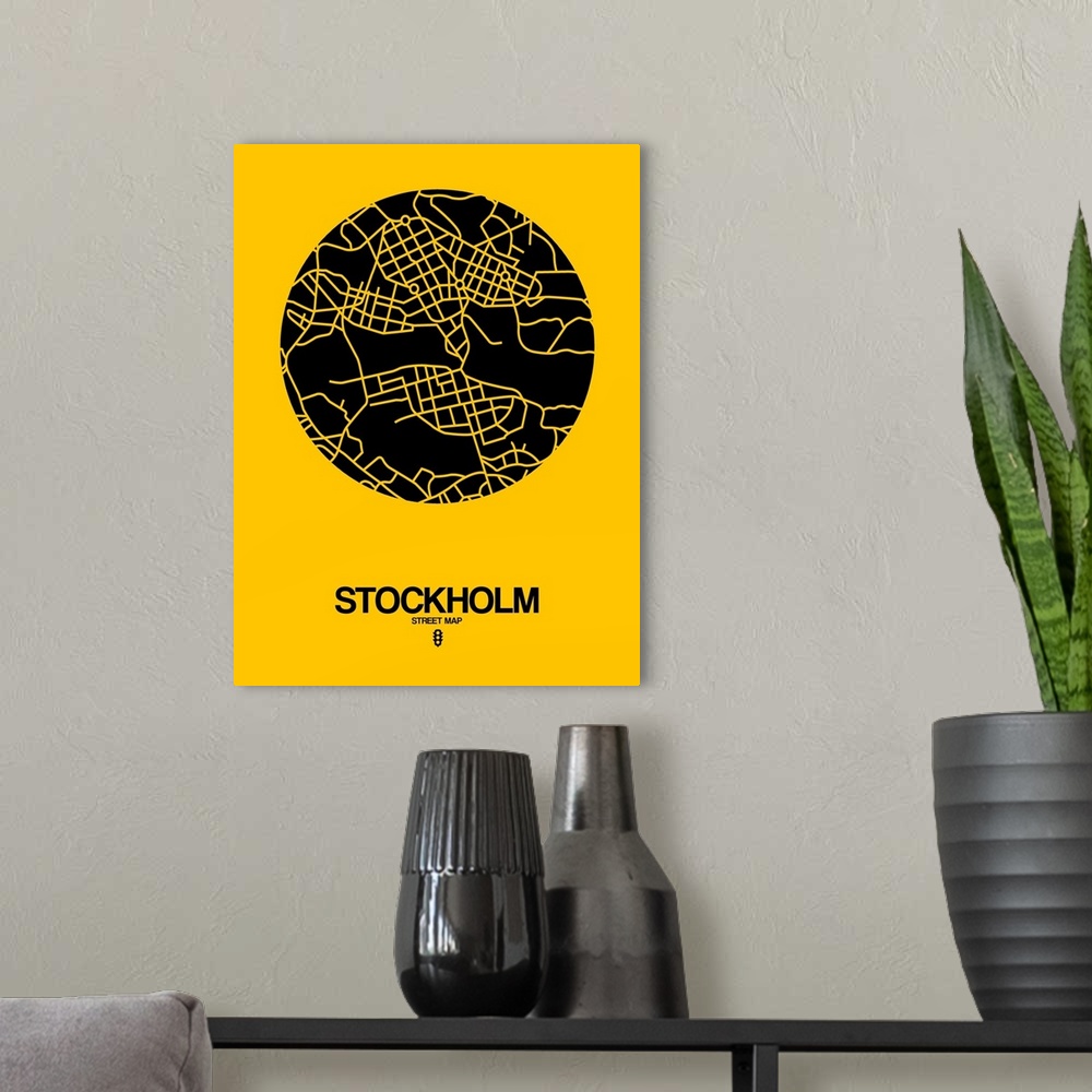 A modern room featuring Minimalist art map of the city streets of Stockholm in yellow and black.