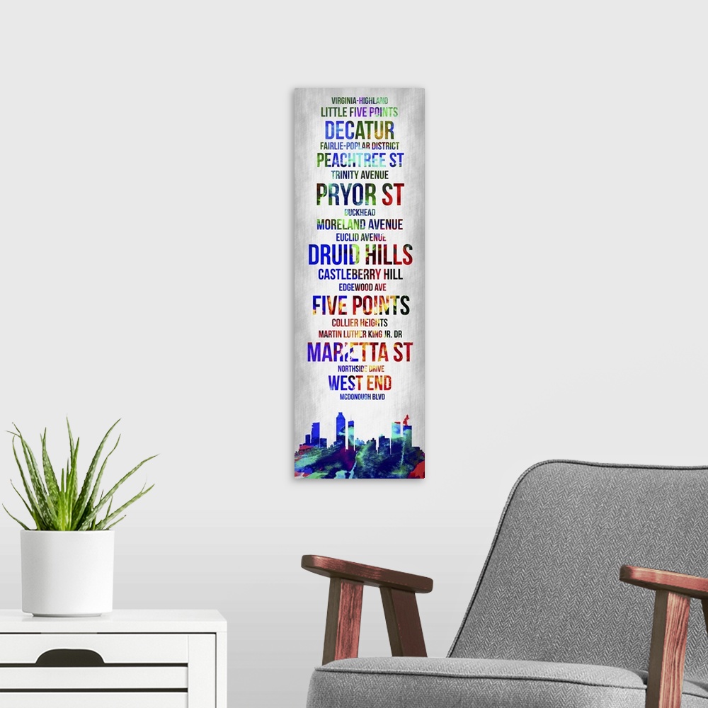 A modern room featuring Contemporary watercolor bus roll art incorporating the Atlanta city skyline.