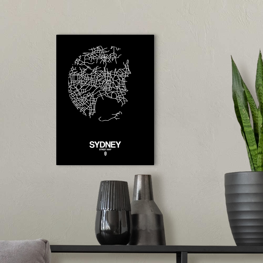 A modern room featuring Minimalist art map of the city streets of Sydney in black and white.