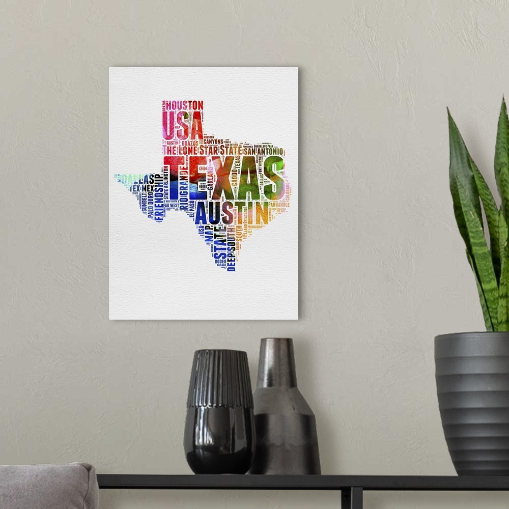 A modern room featuring Watercolor typography art map of the US state Texas.