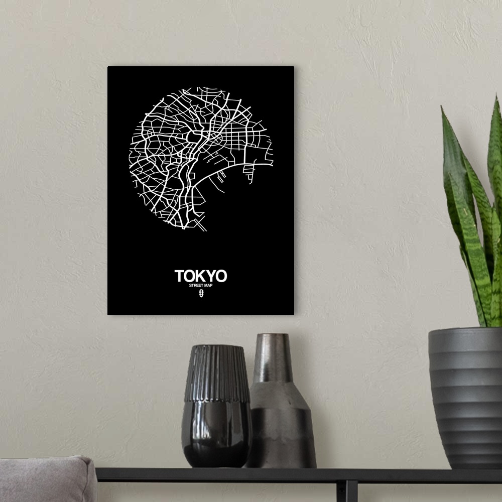 A modern room featuring Minimalist art map of the city streets of Tokyo in black and white.