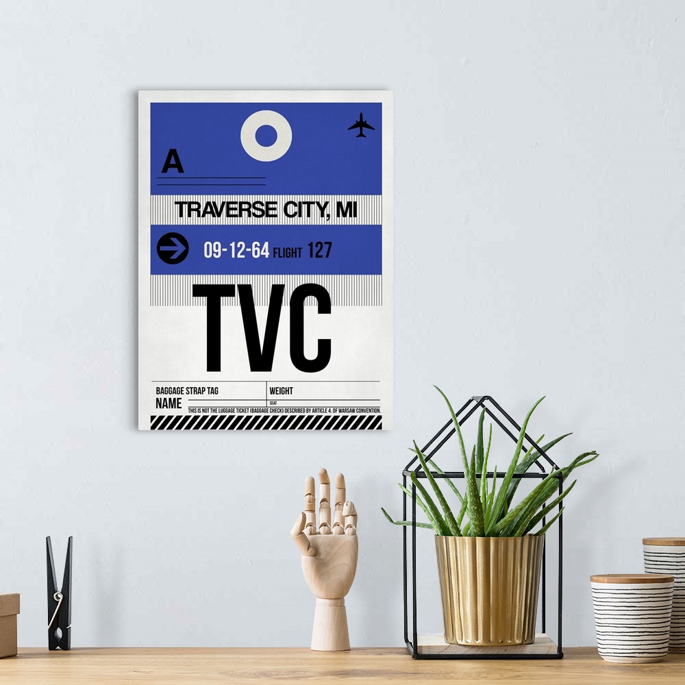 A bohemian room featuring TVC Traverse City Luggage Tag I