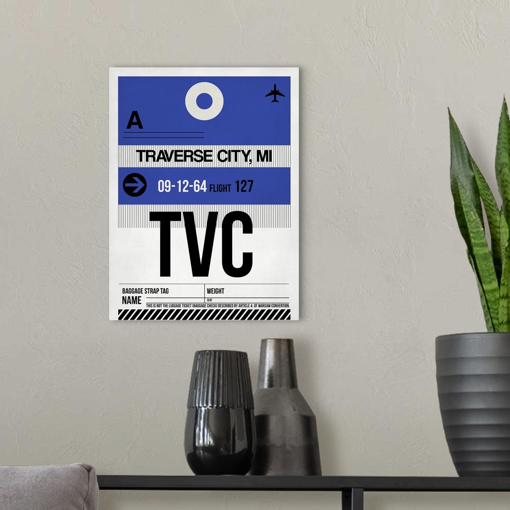 A modern room featuring TVC Traverse City Luggage Tag I