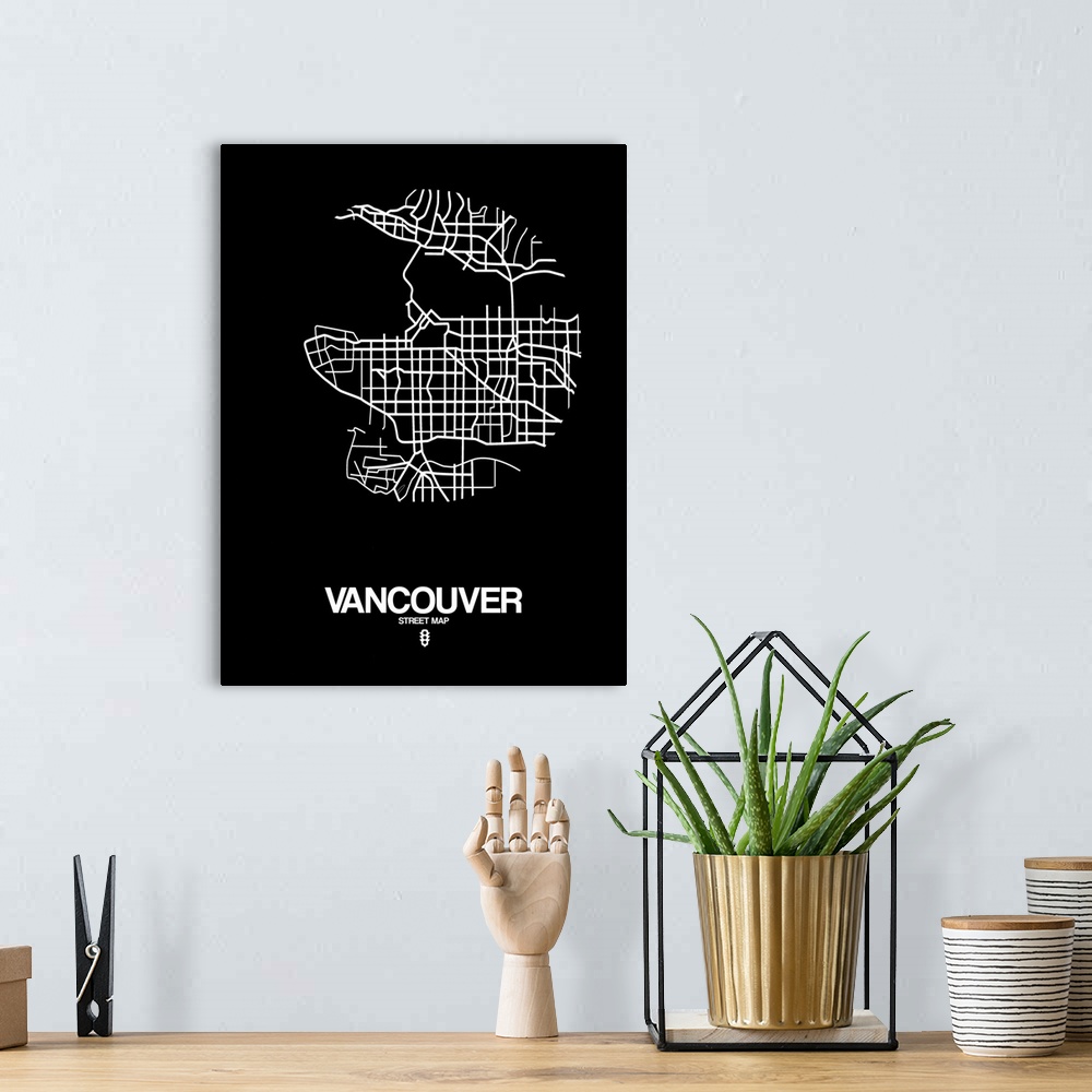 A bohemian room featuring Minimalist art map of the city streets of Vancouver in black and white.