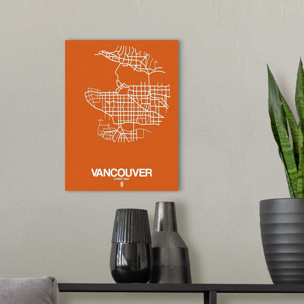 A modern room featuring Minimalist art map of the city streets of Vancouver in orange and white.