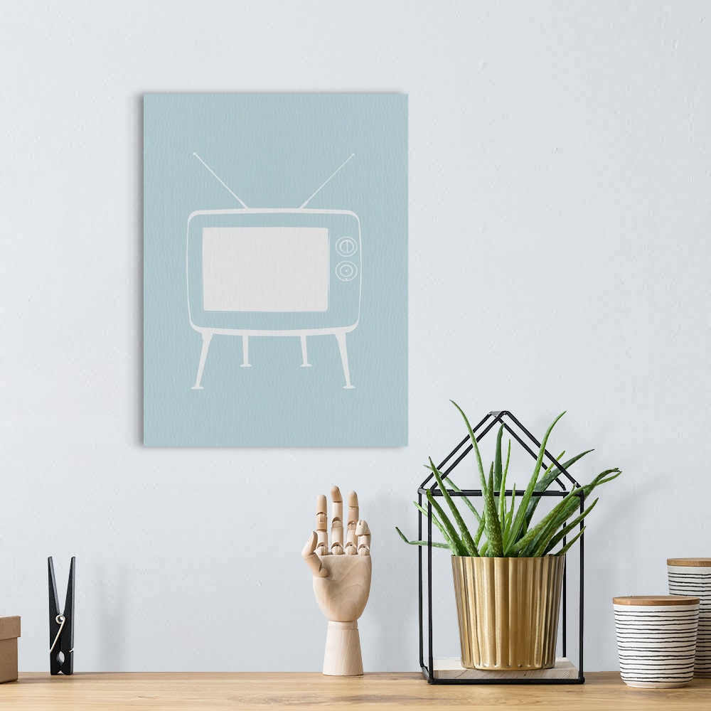 A bohemian room featuring Vintage TV Blue Poster