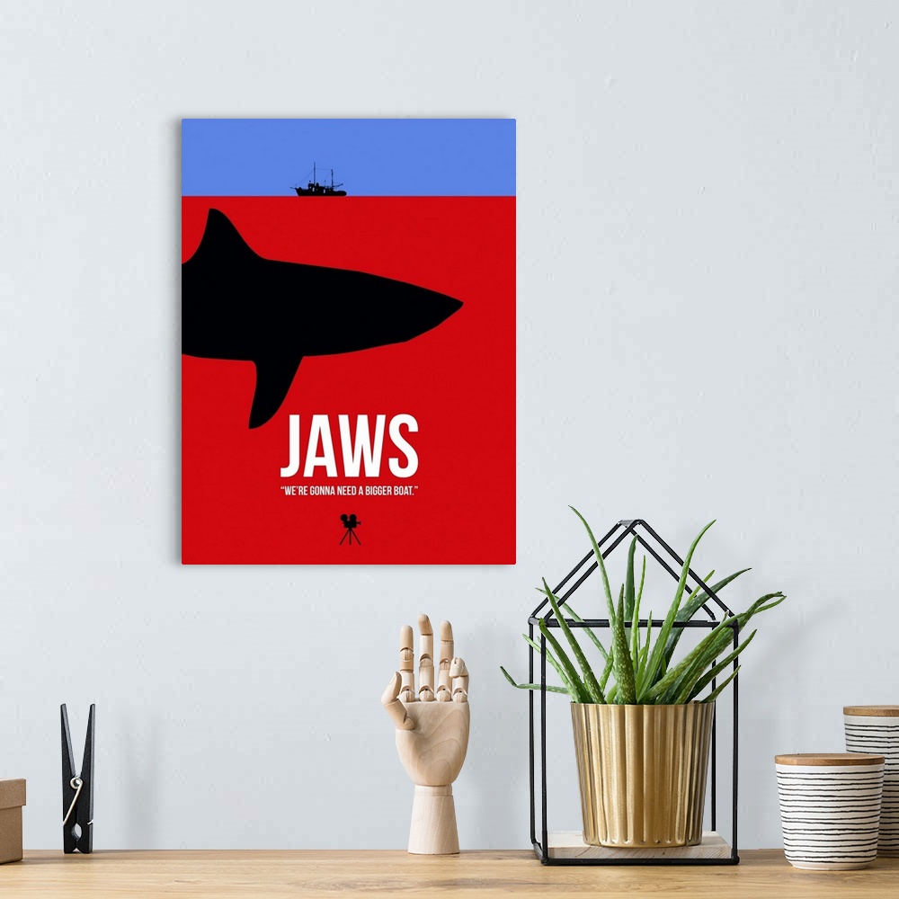 A bohemian room featuring Contemporary minimalist movie poster artwork of Jaws.