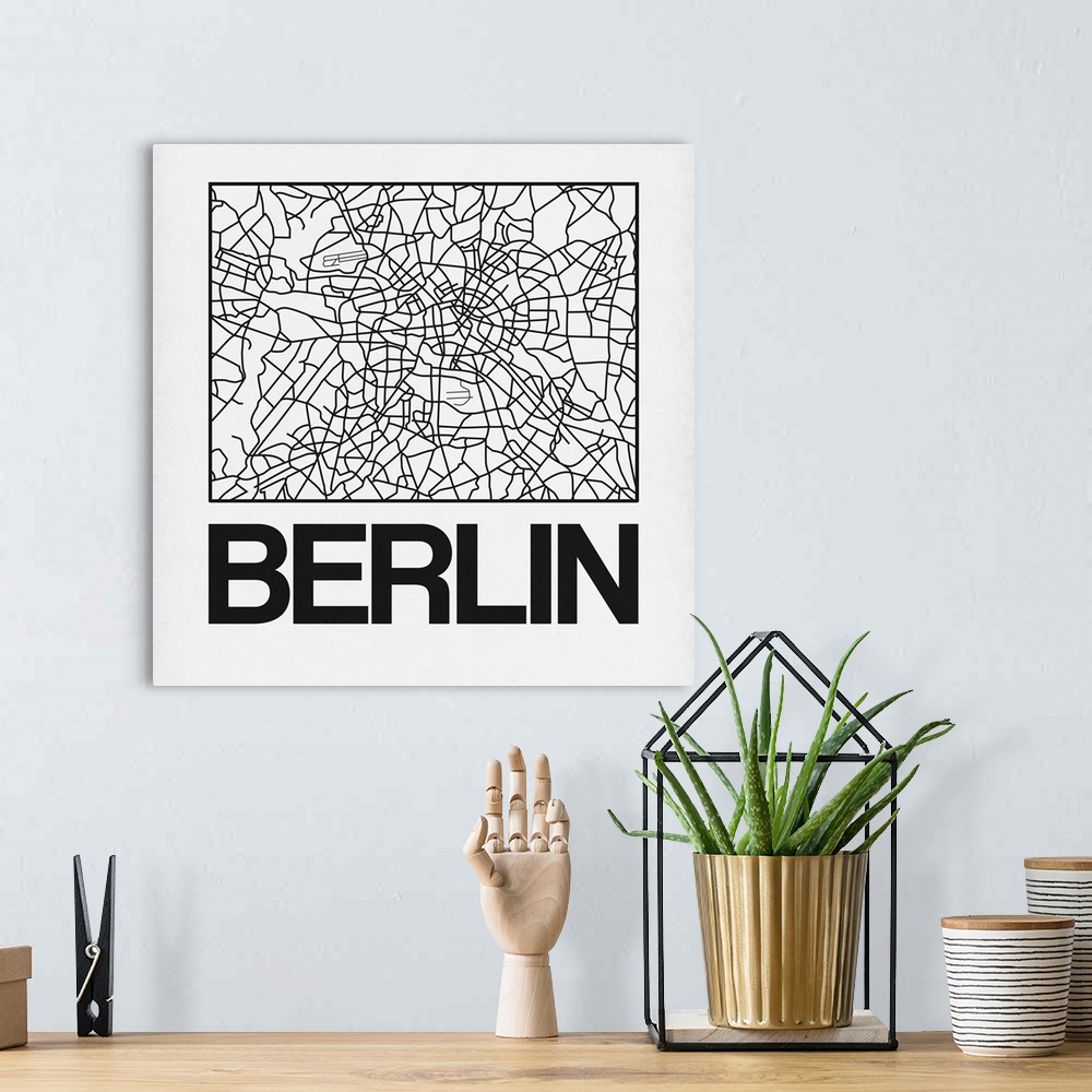 A bohemian room featuring Contemporary minimalist art map of the city streets of Berlin.