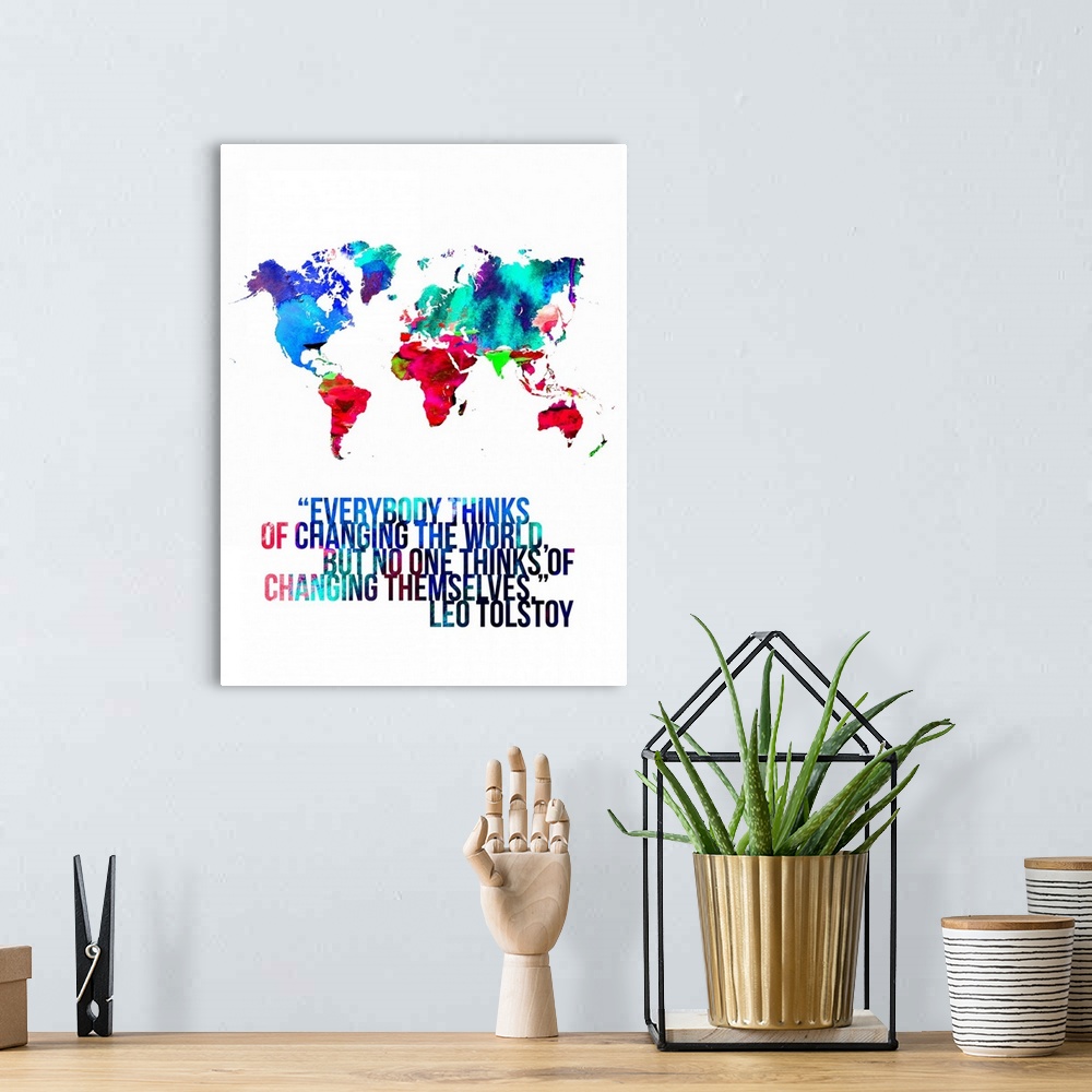 A bohemian room featuring World Map Quote - Leo Tolstoy