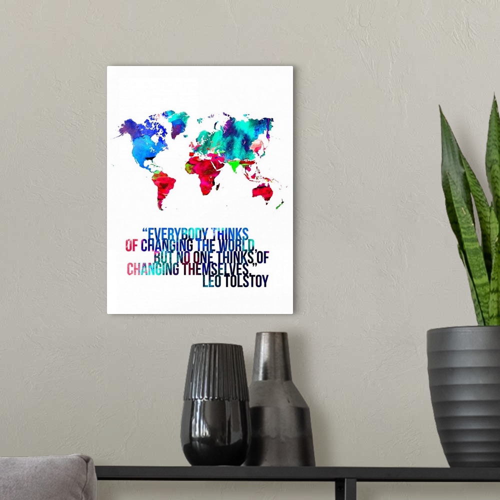 A modern room featuring World Map Quote - Leo Tolstoy
