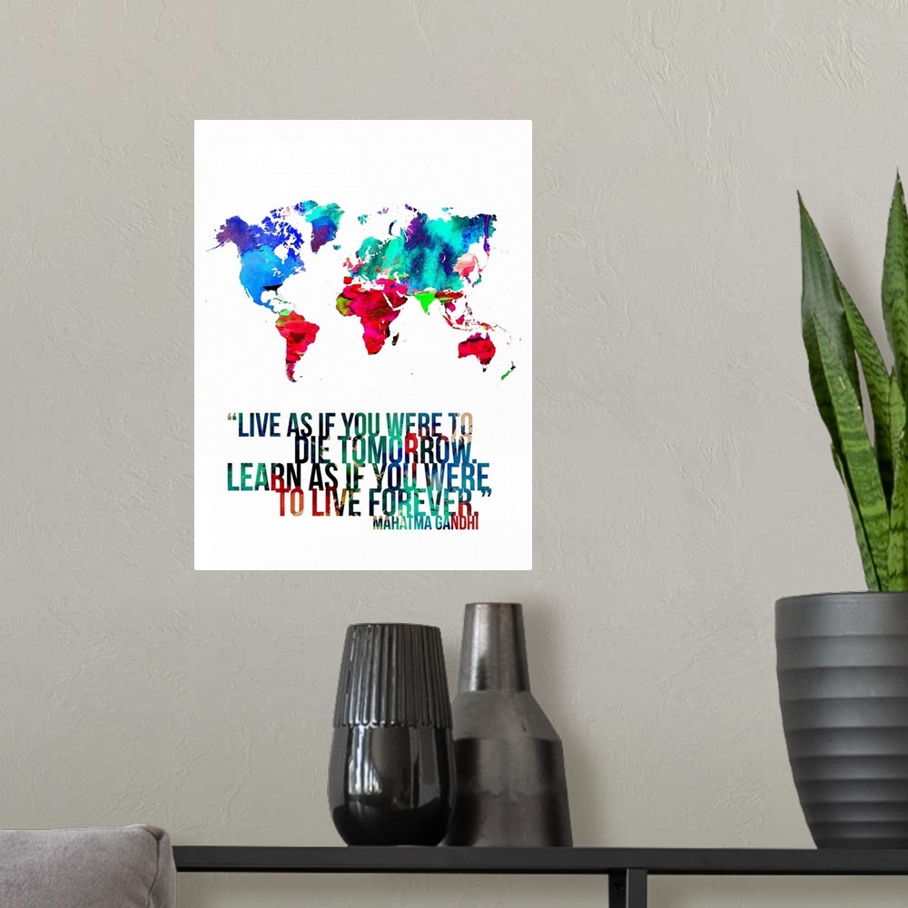 A modern room featuring World Map Quote - Mahatma Gandhi