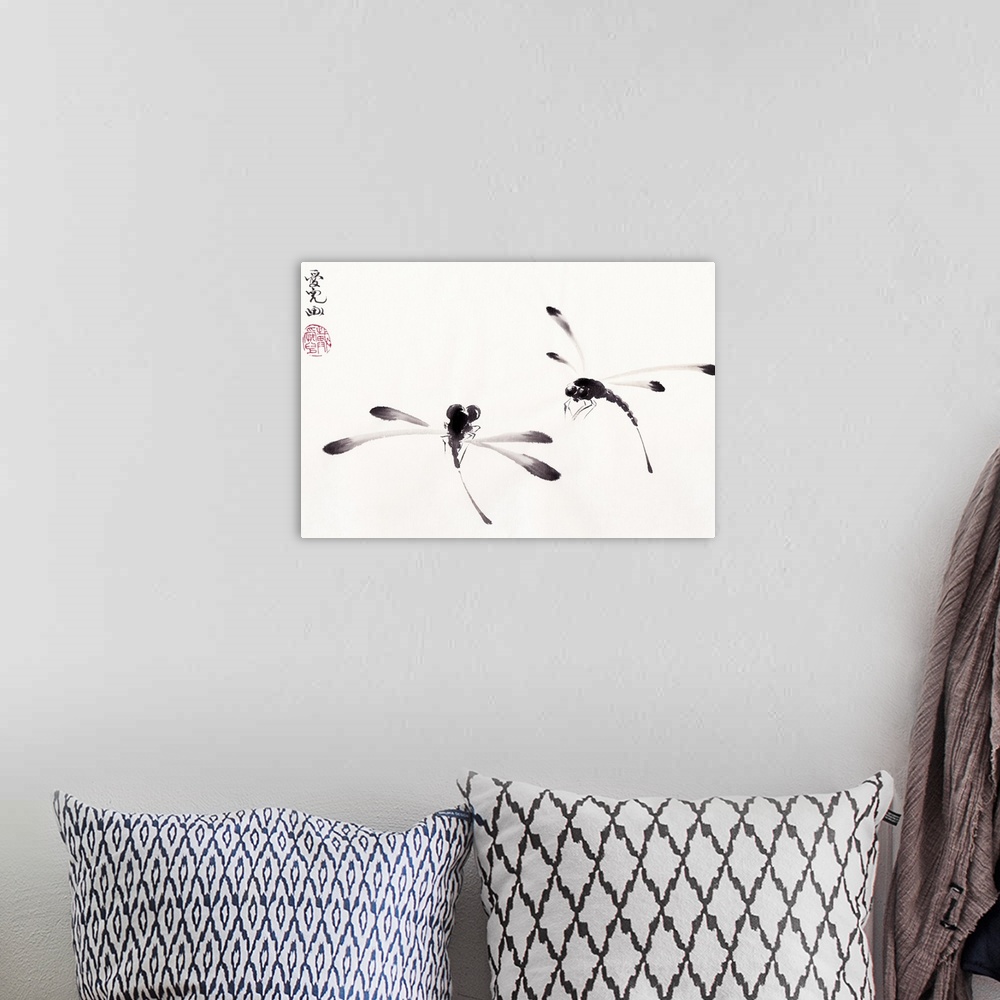 A bohemian room featuring Chinese ink painting of two dragonflies on a white background.