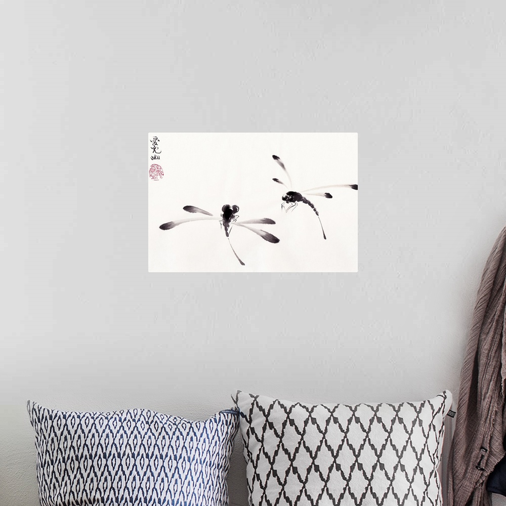 A bohemian room featuring Chinese ink painting of two dragonflies on a white background.