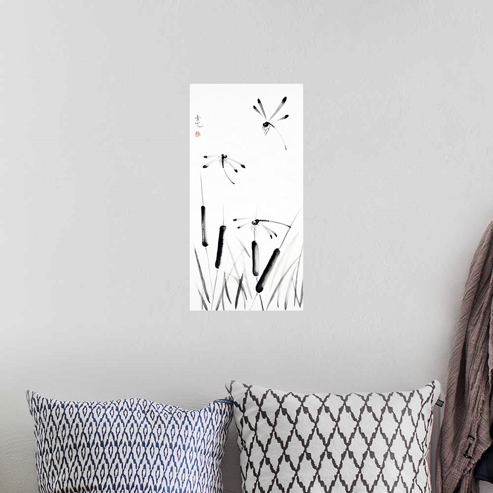 A bohemian room featuring Chinese ink painting of cattails and dragonflies.