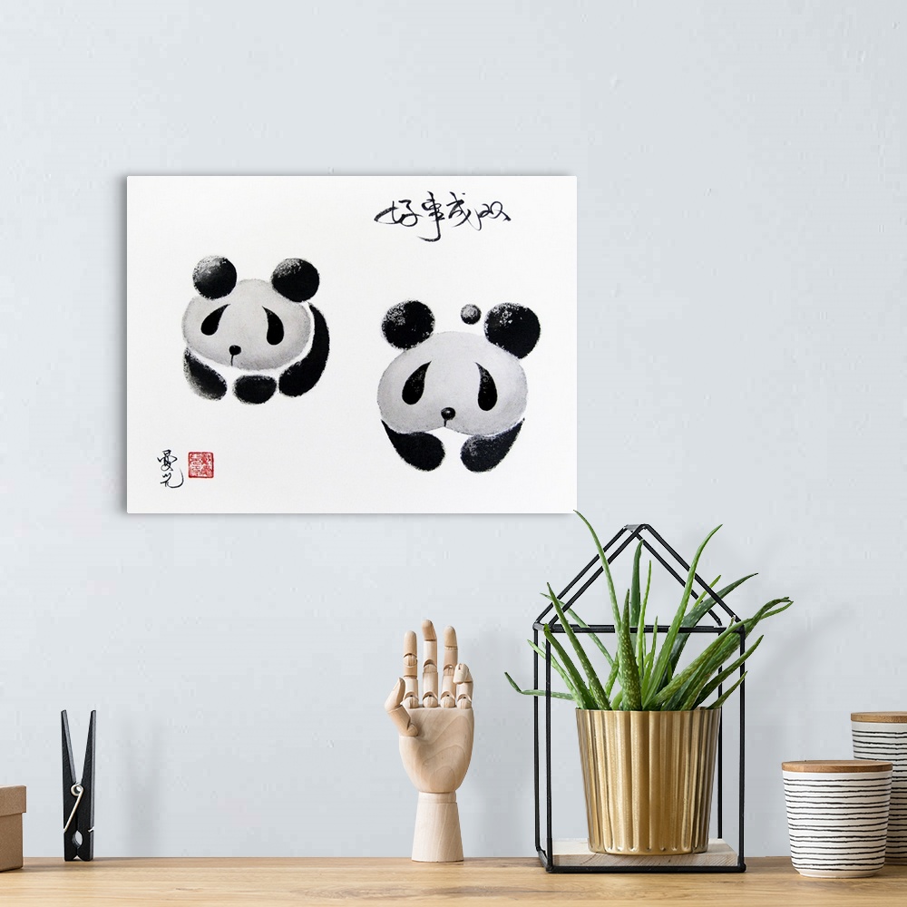 A bohemian room featuring Chinese ink on canvas painting of two panda bears with the saying "Good Things Come in Pairs"