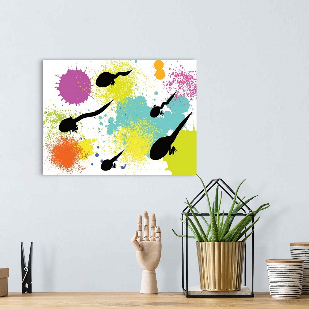 A bohemian room featuring Vibrant artwork with tadpoles on a paint splattered background.