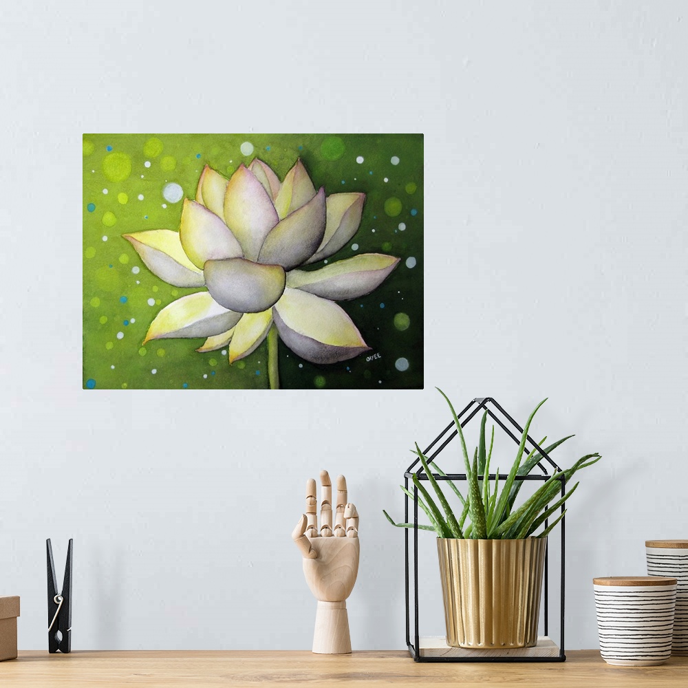 A bohemian room featuring Painting of a white lotus flower on a green background with blue, white, and light green dots.