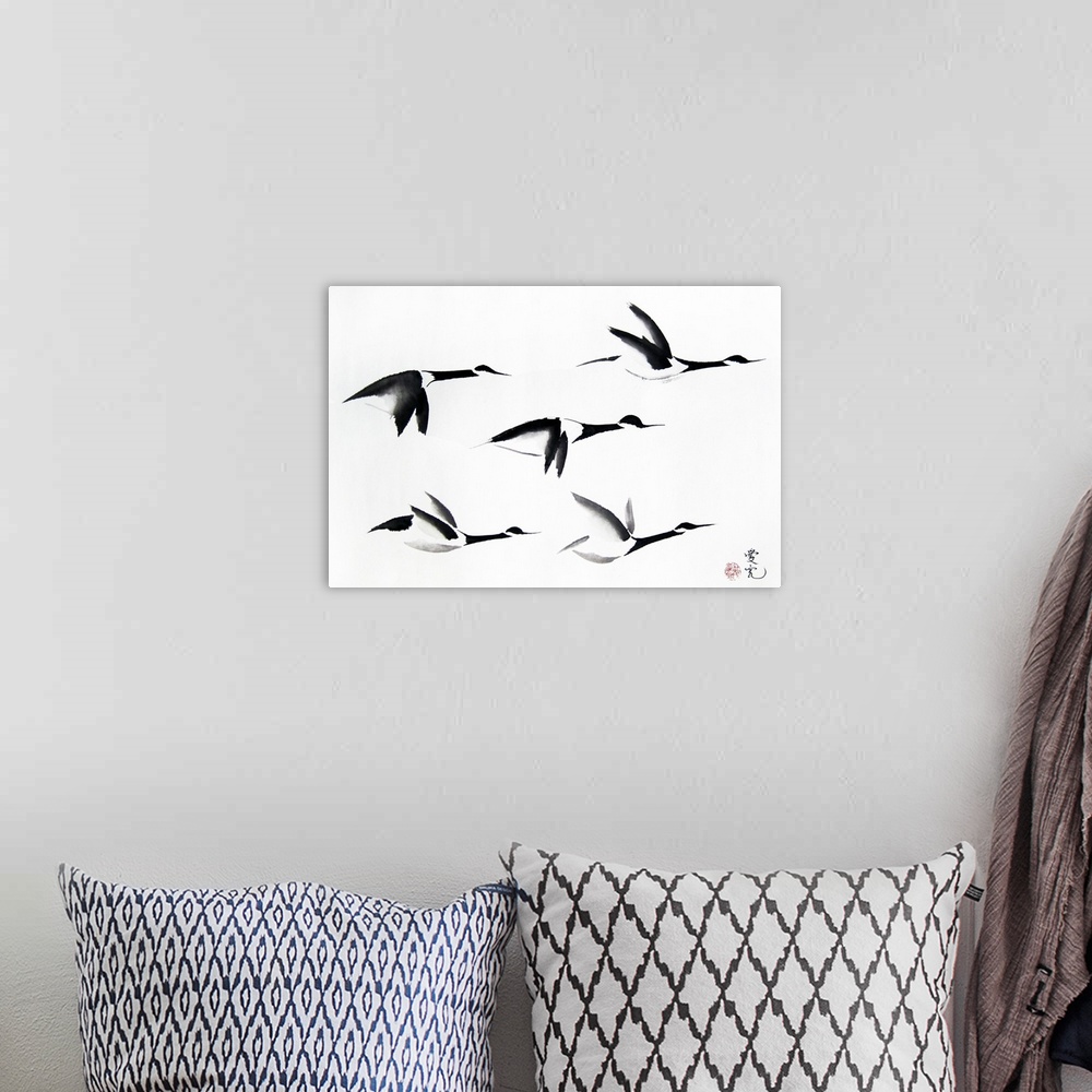 A bohemian room featuring Chinese ink painting of Canadian geese  migrating south.