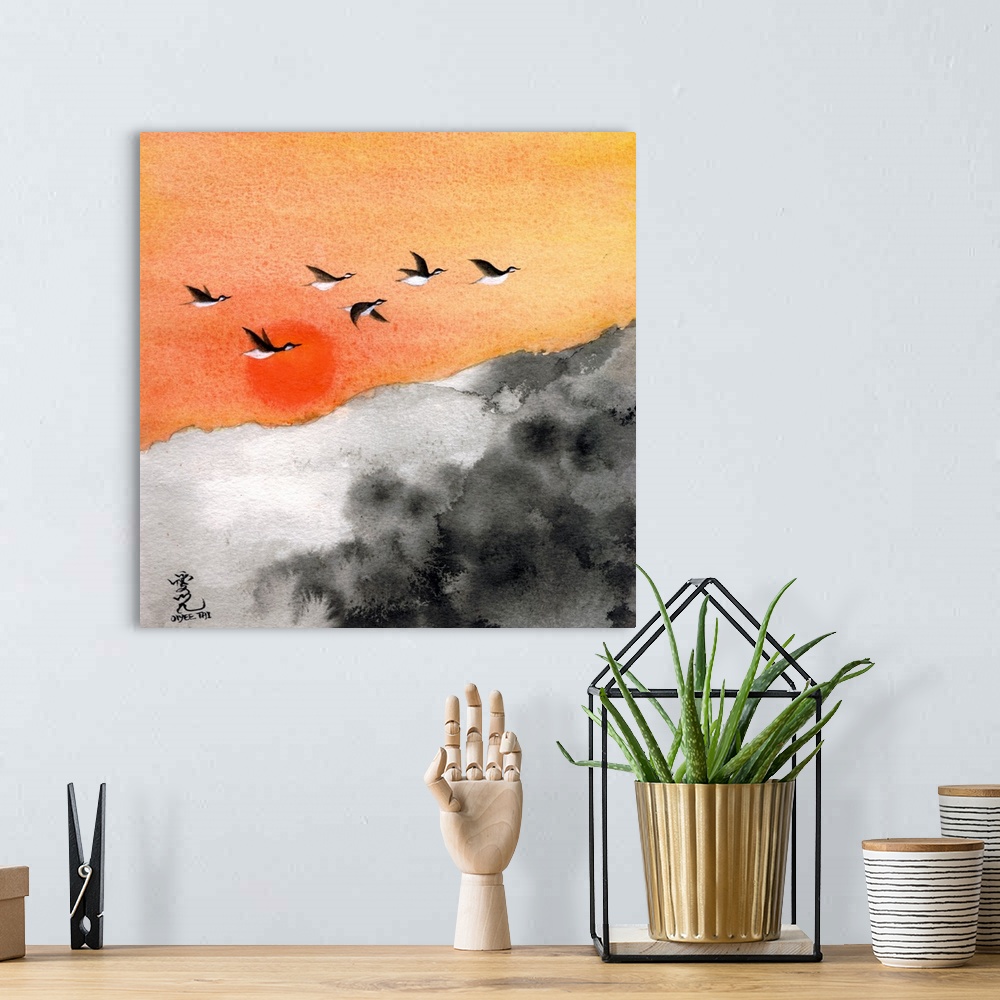 A bohemian room featuring Square painting of a warm sunset with birds flying through and a black and white landscape below.