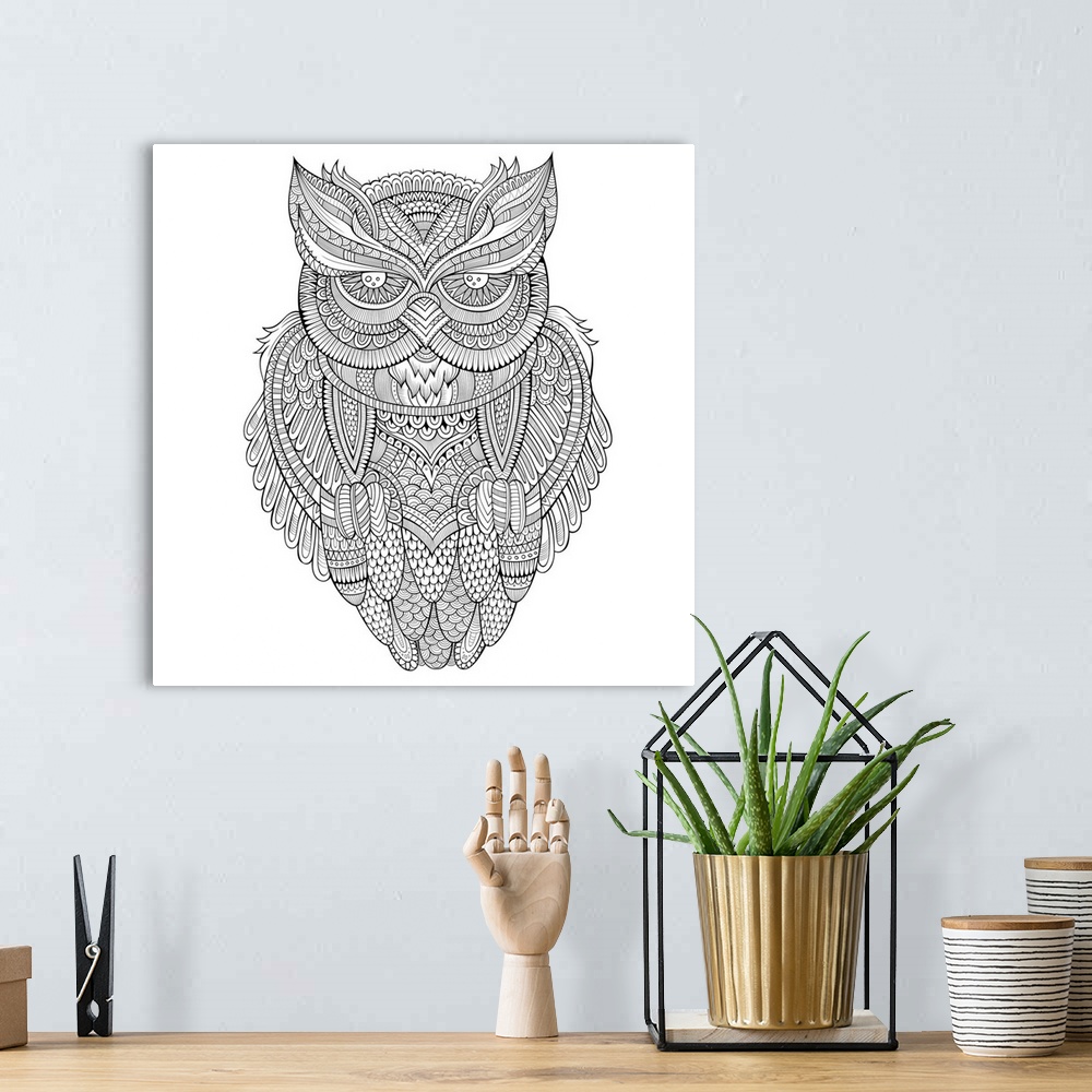A bohemian room featuring An intricately patterned owl with large eyes and detailed feathers.
