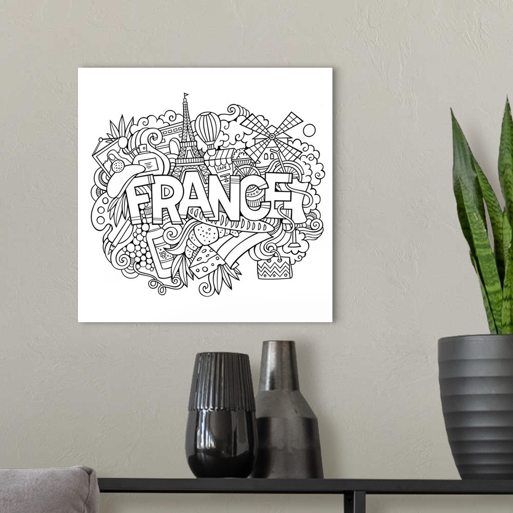 A modern room featuring Several French-themed objects, including the Eiffel Tower and pastries, surrounding the word "Fra...