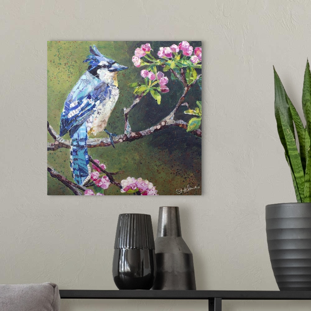 A modern room featuring Blue jay on flowering apple blossom branch.