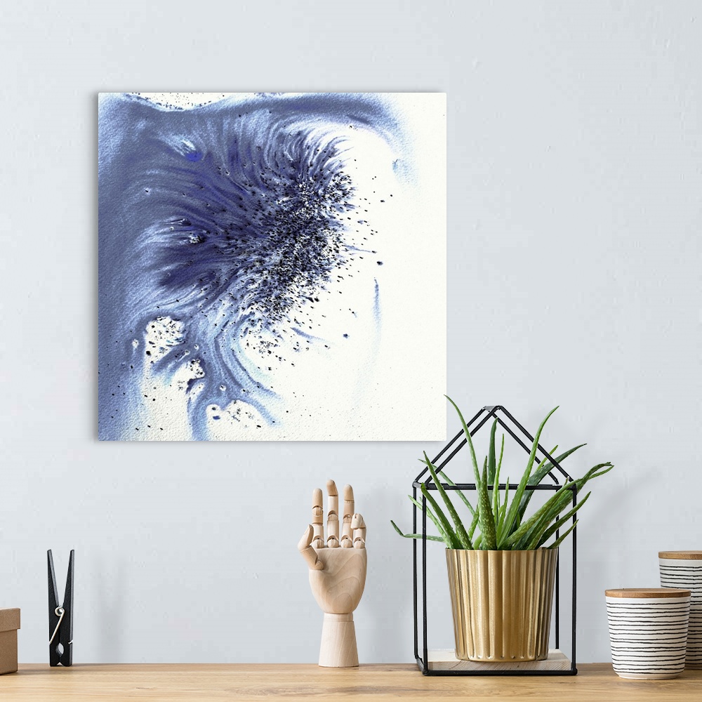 A bohemian room featuring Abstract artwork in blue splashes and drips and flowing paint.