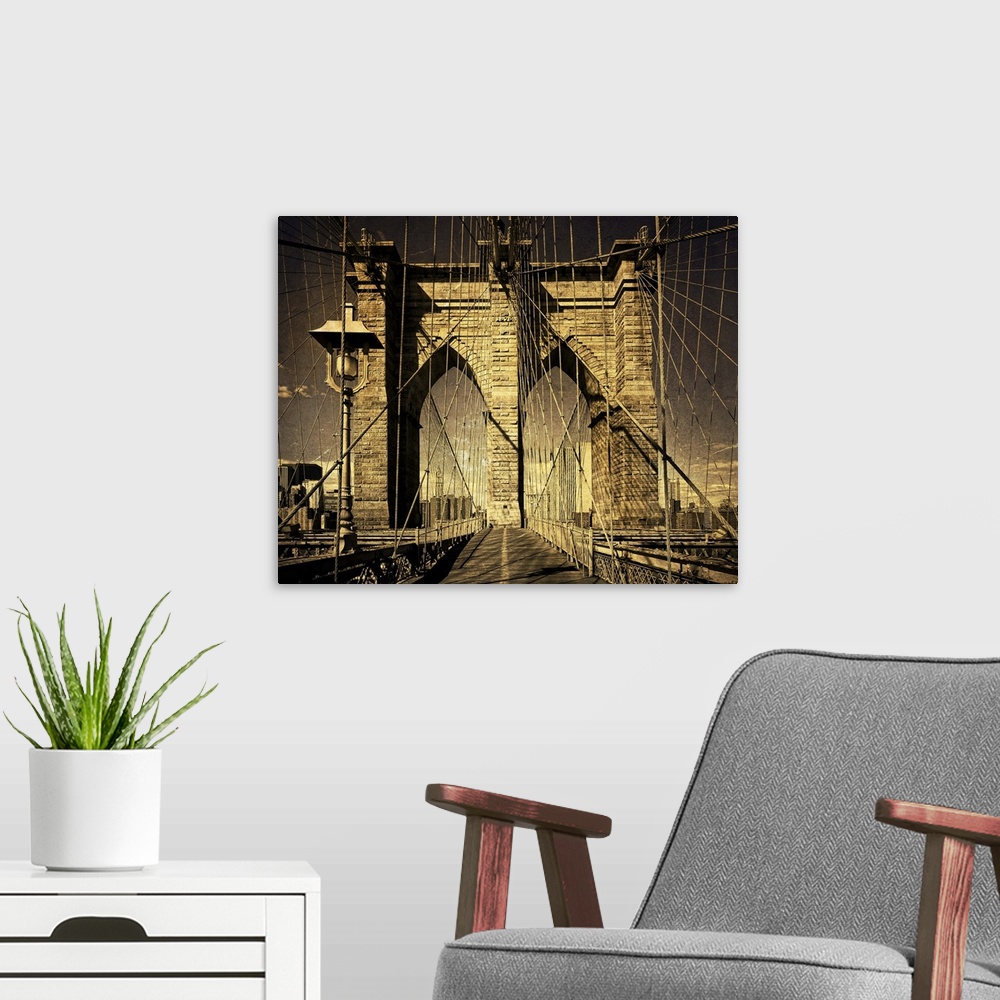 A modern room featuring Distressed photograph of the Brooklyn Bridge arches and suspension cables.