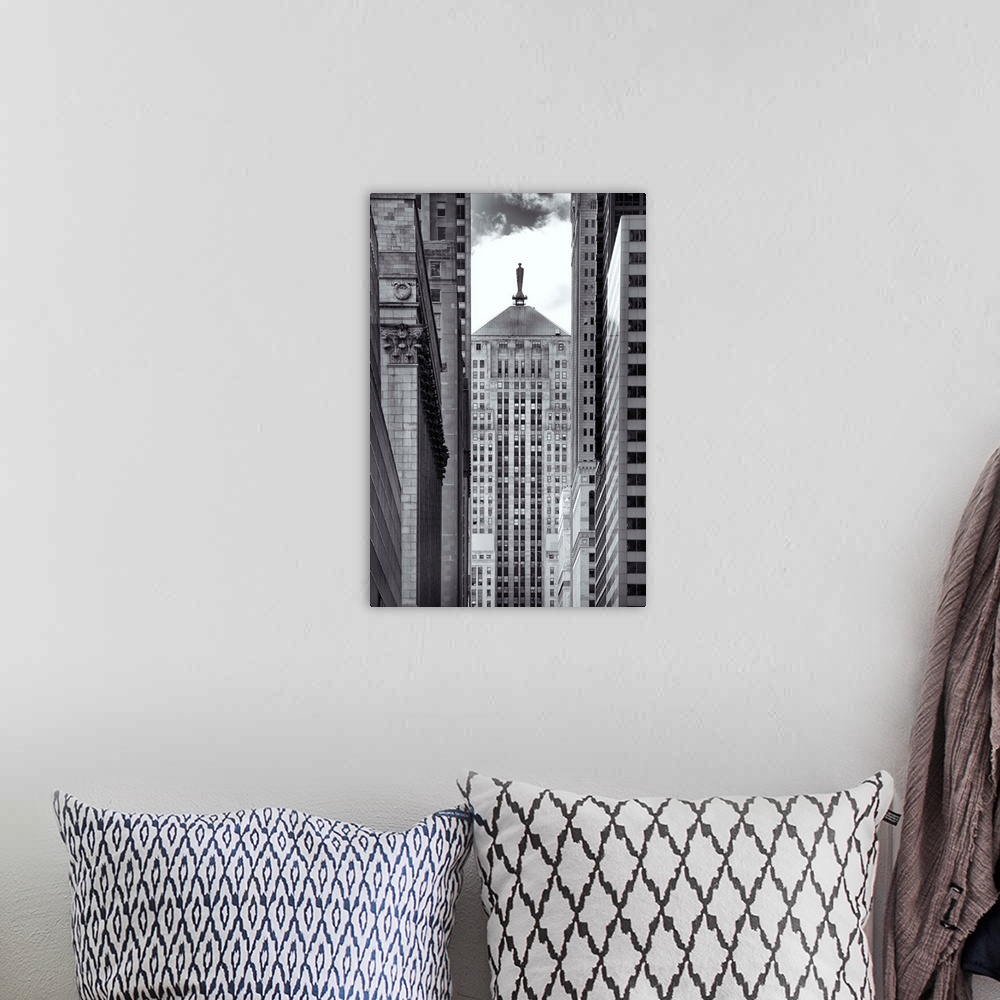 A bohemian room featuring Black and white photograph through a narrow way through tall buildings in Chicago.